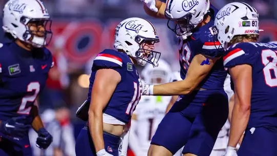 wide receiver Brandon Phelps (18), tight end Henry Gabalis (88), tight end Tyler Powell (87) — TUCSON, ARIZ. -- Football vs. Cincinnati at Casino Del Sol Stadium. Oct. 3, 2026. Photo by Mike Christy / Arizona Athletics