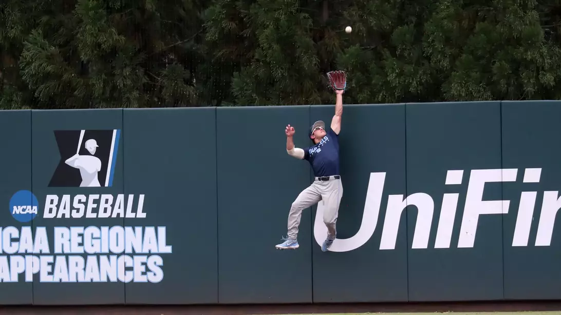 ...makes a fantastic catch in right-center...