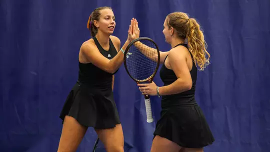 Alexia Jacobs and Marie Weissheim high five