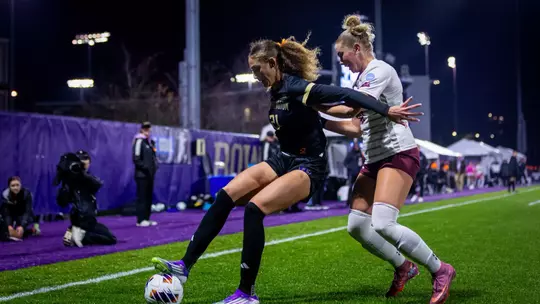 Kalea Eichenberger plays a ball in the corner against Montana