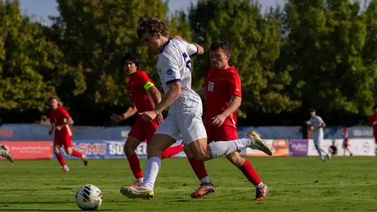 Zach Ramsey dribbles the ball against SMU in the second round of the NCAA Tournament