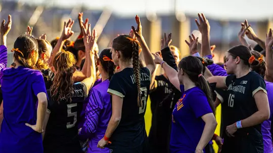 Team huddle pregame before Sweet 16 match vs. Virginia