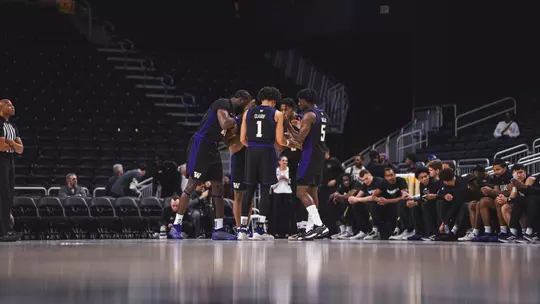 UW Men's Basketball huddle vs Colorado at Acrisure Classic