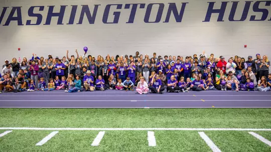 UW student-athletes play sports and interact with kids during Husky Heroes