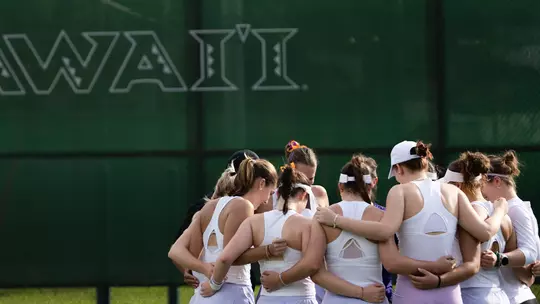 Women's Tennis Team Huddle