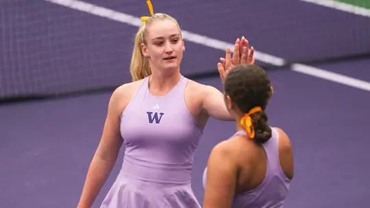 Reece Carter and Jermine Sherif high five in match versus Boise State
