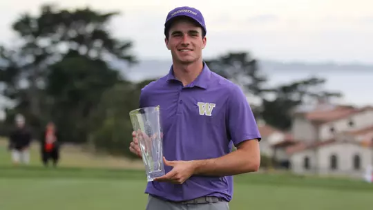 Hamish Farquharson holds the Saint Mary's Invitational Individual Trophy