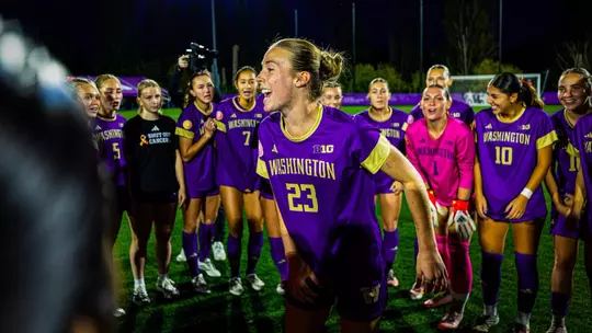 Lucy Newlin in the pregame huddle vs. Iowa