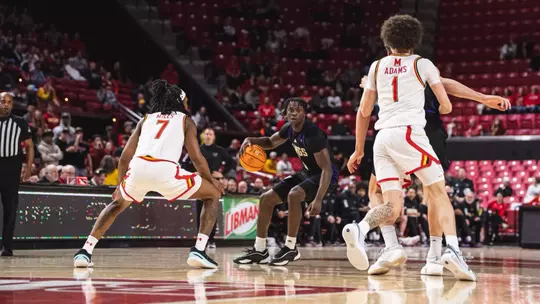 Zoom Diallo dribbling against Maryland