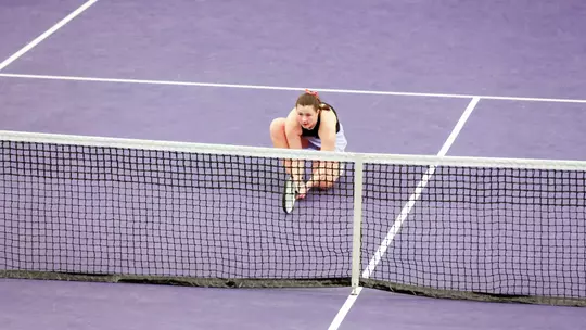 Carina Syrtveit awaits serve versus San Diego