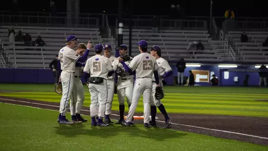 Team huddle against SDSU
