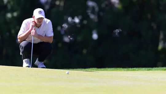 Grady Millar reads a putt at The Desimone Invitational