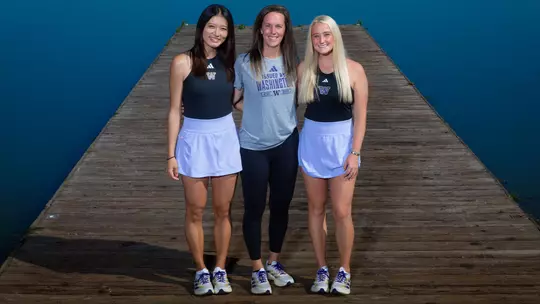 Erika Matsuda, Robin Stephenson and Reece Carter stand on the conibear dock