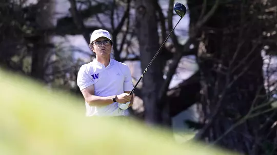Jacob Goode watches his tee shot
