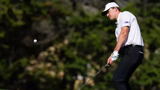 Grady Millar chips the ball out of the rough