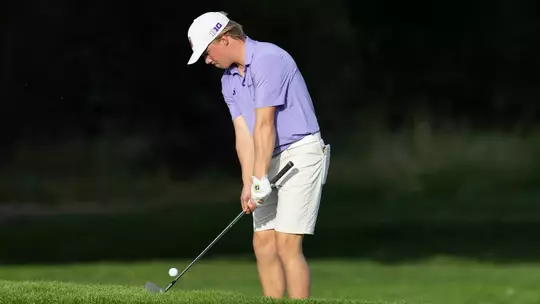 Emil Herstad chips the ball out of the rough at The Goodwin
