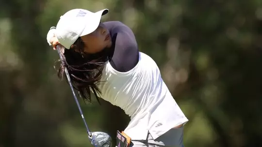 Carmen Lim mid swing