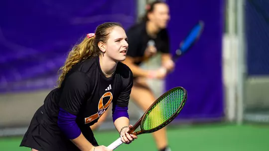 Marie Weissheim and Alexia Jacobs wait for a serve