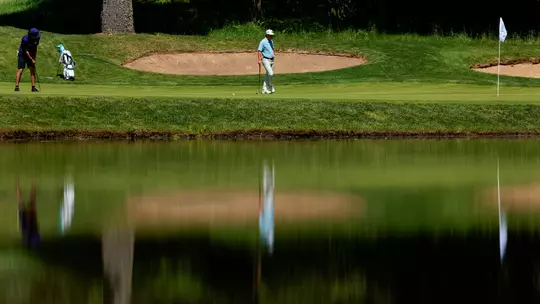Jacob Goode hits a long putt during the Big Ten Championships