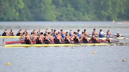 Washington's women's varsity eight crew rowing to the finish line at 2026 Big Ten Rowing Championships in Indianapolis