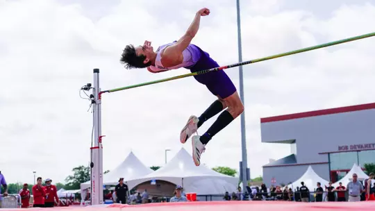 Leland Lieberg going over the bar in the high jump at 2026 Big Ten Championships