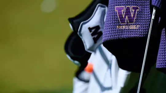 Close up shot of a W logo men's golf towel on a golf bag