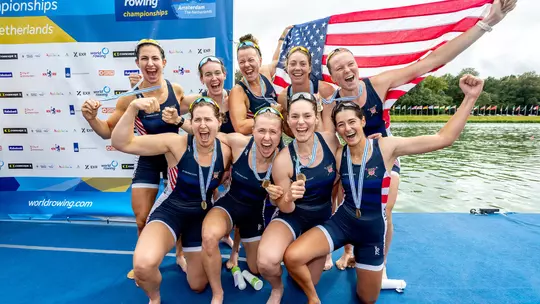 the u.s. women's eight on the medal stand at 2026 World Rowing Championships