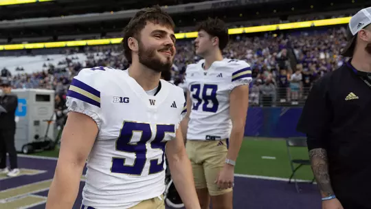 Tyler Robles stands on the sideline during UW's spring game