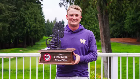 Finn Koelle holds the 2026 Sahalee Players Championship individual champion trophy