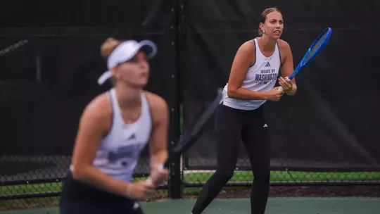 Alexia Jacobs and Marie Weissheim prepare for doubles in the Round of 16 at the ITA All-American Championships