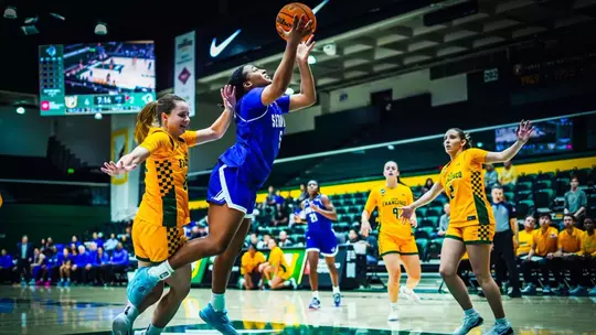 Savannah Catalon drives to the basket against San Francisco on Nov. 15