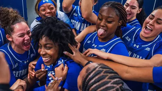 The Pirates celebrate in the locker room at Creighton after defeating the Bluejays on Dec. 22.