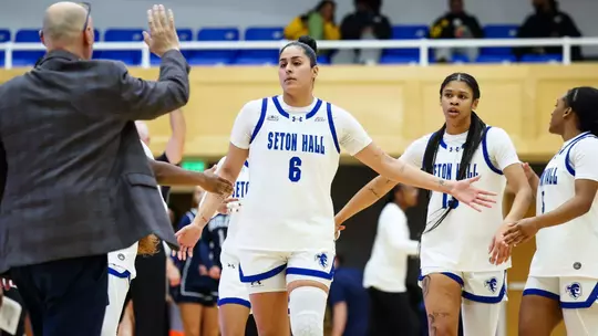 Mariana Valenzuela high-fives her teammates and coaches during Seton Hall's game vs. Butler on Dec. 4