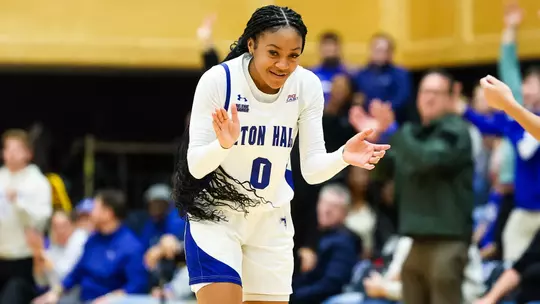 Jada Eads applauds during a game in the 2024-25 season