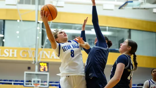 Zahara Bishop shoots over a pair of Villanova players on Feb. 26