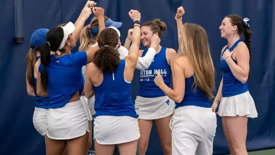 Tennis Team Huddle