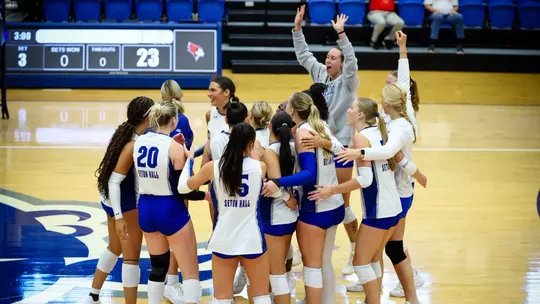 Seton Hall volleyball team celebrates after defeating Illinois State on Aug. 28.