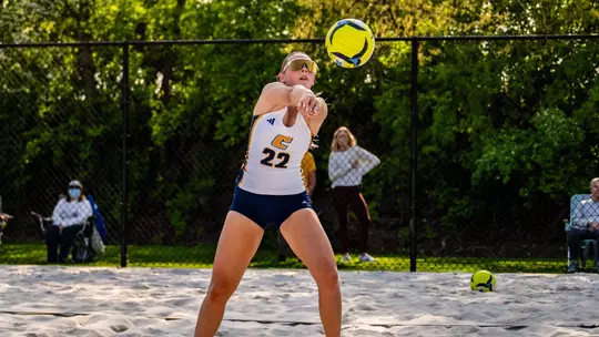 Madison LaRue passes the ball to her teammate against Ten. Tech