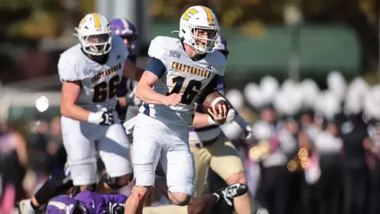 Battle Alberson runs away from the Western Carolina defense.