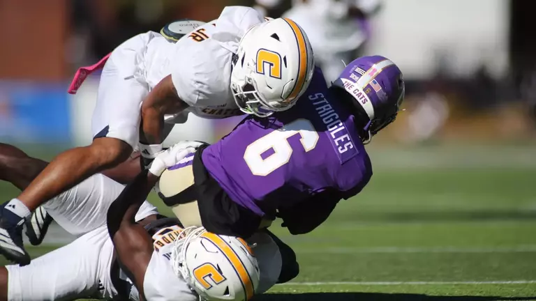 Defense makes another crunching tackle on a Western Carolina receiver.