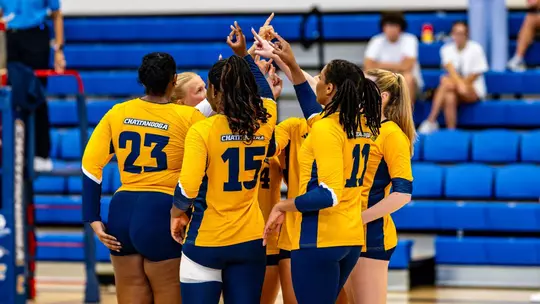 Chattanooga in a huddle before the start of a match