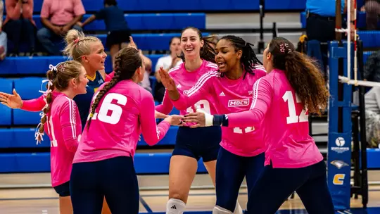 The Mocs celebrating a point against ETSU