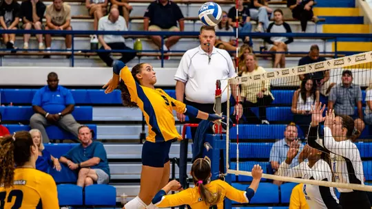 Jordin Glass going for the spike against Tennessee State