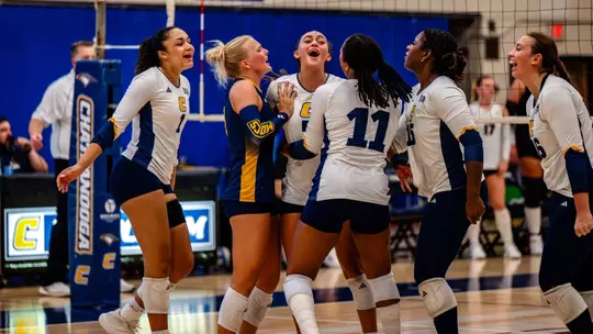 Volleyball celebrating after a point in its match against Valpo in the Chattanooga Classic