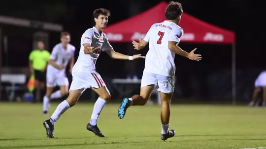 Baylen Young and Myles Culley celebrate Culley's goal