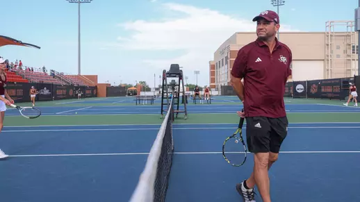 STILLWATER, OK - May 19, 2024 - Head Coach Mark Weaver of the Texas A&M Aggies during the NCAA Championship game between the Georgia Bulldogs and the Texas A&M Aggies at Greenwood Tennis Center in Stillwater, Oklahoma. Photo By Ishika Samant/Texas A&M Athletics