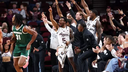 COLLEGE STATION, TX - December 14, 2025 -The Texas A&M Aggies Men's Basketball Team during the game between the Jacksonville Dolphins and the Texas A&M Aggies at Reed Arena in College Station, TX. Photo By Sydney Stevenson/Texas A&M Athletics