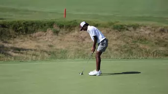 Shiv Parmar attacks a 40 foot putt at the Ben Hogan Collegiate