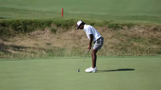 Shiv Parmar attacks a 40 foot putt at the Ben Hogan Collegiate