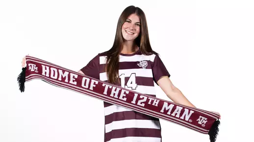Ava Sexton dons a "Home of the 12th Man" Aggie soccer scarf during her recruiting weekend portrait shoot.